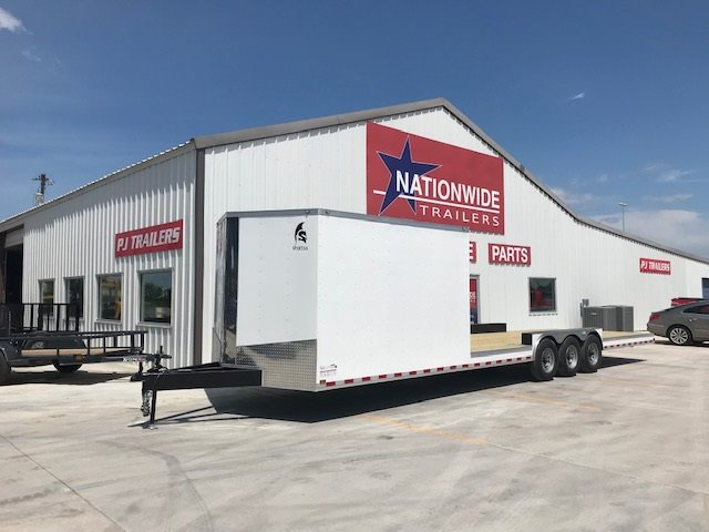 Custom-built white enclosed cargo with open flatbed trailer and triple axles, from Spartan Cargo Trailers